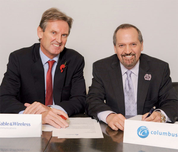 Phil Bently, Chief Executive Officer of Cable and Wireless Communications (left) and Brendon Paddick, CEO and Chairman of Columbus Communications