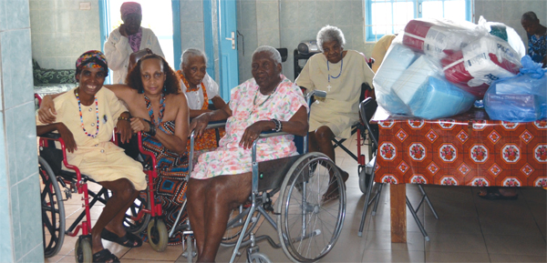 Ms. John (second from left) with some of the elderly  recipients.