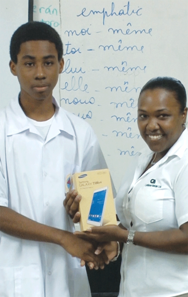 Jannick Paul receives his prize from Shanaz Narcisse.