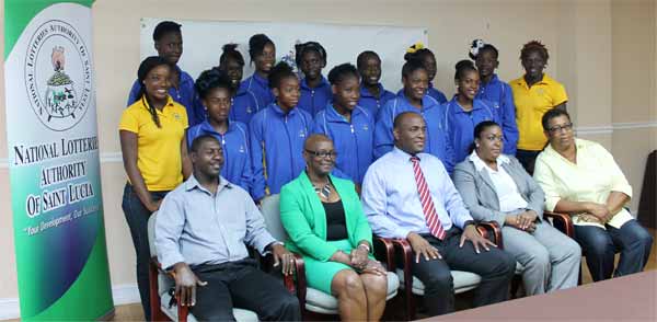 Photo moment for team St. Lucia along with Minister for Youth Development and Sports, other ministry officials and President SLNNA Liota Charlemagne - Mason. [Photo: Anthony De Beauville]