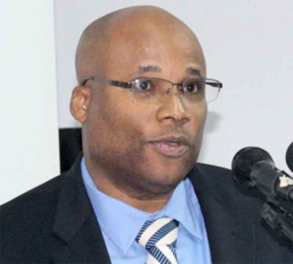 Permanent Secretary, Ministry of Finance, Economic Affairs and Social Security, Dr. Reginald Darius.