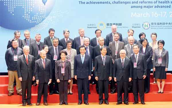 President Ma Ying-Jeou (Front-Center)  and Mr. Chiang  Been-Huang, Minister of Health & Welfare  (Front-right 3) attend "Taiwan's National Health Insurance 20th Anniversary  Symposium and round table" , March 16th, 2015 