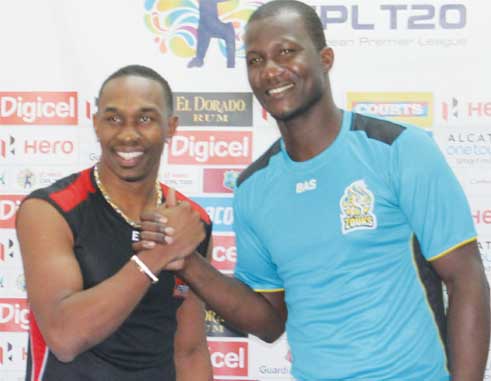Image: (L-R) Trinidad and Tobago Red Steel's Dwayne Bravo and St. Lucia Zouks' Darren Sammy say: "Let the game begin". (Photo: Anthony De Beauville)