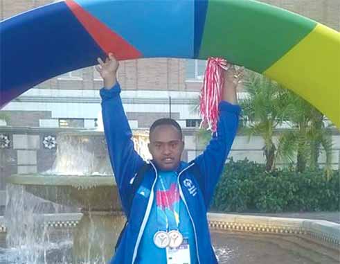 Gold medal moment for St. Lucia Cecil Fevriere. (photo: St. Lucia Special Olympics)