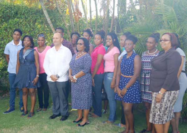 Ambassador Soberon (Fourth from left) with scholarship winners and St. Lucia government officials.