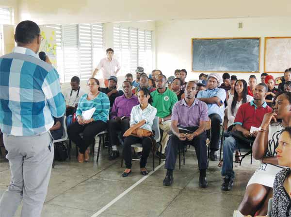 Augier addressing the youth leaders in Piaye recently.