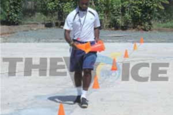 Despite the continuing work on the court Physical Education Teacher Solomon Alexander all set for a training session. [Photo: Anthony De Beauville]