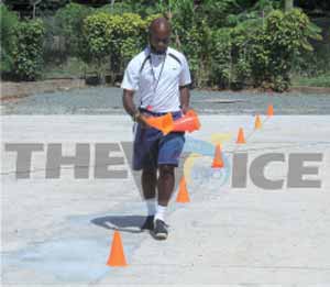 Despite the continuing work on the court Physical Education Teacher Solomon Alexander all set for a training session. [Photo: Anthony De Beauville]