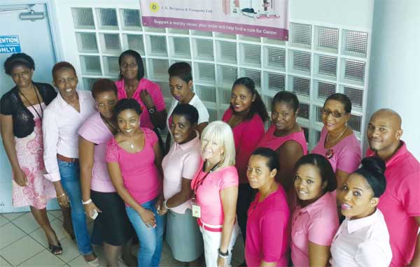 Image: J. E. Bergasse staff wearing pink.