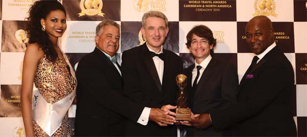 Image- From left to right: World Travel Awards model, Gary Williams; General Manager of Sandals Royal Bahamian Spa Resort & Offshore Island ; Jeremy Mutton, General Manager of Sandals Emerald Baya Spa Golf, Tennis & Spa Resort; RamelSobrino, General Manager of Sandals Ochi Beach Resort and David Latchimy, General Manager of Sandals Negril Beach Resort & Spa