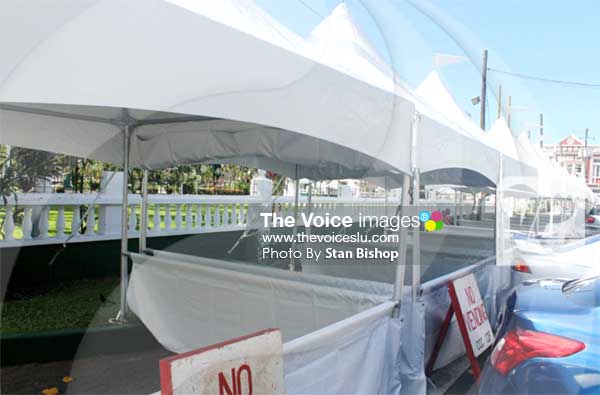 The new white canvas tents for this week’s Asou Square. [PHOTO: Stan Bishop]