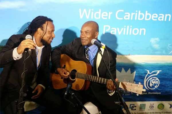 Image: Caribbean artistes perform at UN Climate talks in Paris.