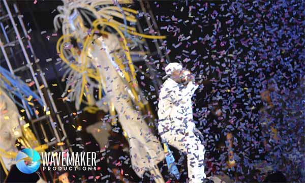 TJ showered with confetti during an appearance in Trinidad.