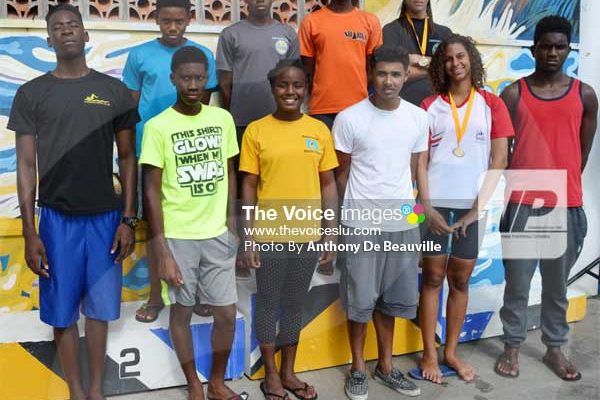 Image: 10 members of the team after Sunday’s CARIFTA Trials at the RHAC front row (l-r) Omar Alexander, Devin Boodha, Mikaili Charlemagne, Mark Emanus, Katie Kyle and Christopher Phillip. Back row) JayhanOdlum - Smith, Jamal Archibald, Eden Crick and TerrelMonplaisir [PHOTO: Anthony de Beauville]