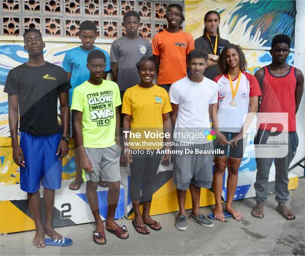 Image: 10 members of the team after Sunday’s CARIFTA Trials at the RHAC front row (l-r) Omar Alexander, Devin Boodha, Mikaili Charlemagne, Mark Emanus, Katie Kyle and Christopher Phillip. Back row) JayhanOdlum - Smith, Jamal Archibald, Eden Crick and TerrelMonplaisir [PHOTO: Anthony de Beauville]
