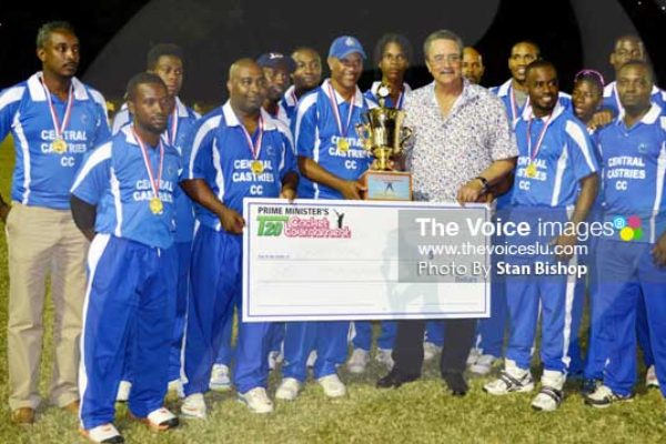 Image: A photo moment for St. Lucia Prime Minister with the winning champions Central Castries [PHOTO: Anthony De Beauville]