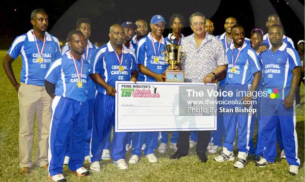 Image: A photo moment for St. Lucia Prime Minister with the winning champions Central Castries [PHOTO: Anthony De Beauville]