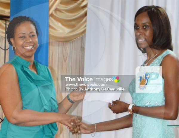 Image: LIME representative Cheryl Francis presenting a gift. (PHOTO: Anthony De Beauville)
