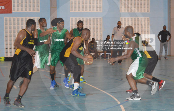 img:Some of the action between VBCC and Micoud Hustlerz on Thursday evening (Photo Anthony De Beauville)
