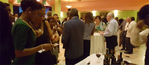Image: Guests viewing the wine selection from event sponsors La Cantina Wines and Barbay Ltd.
