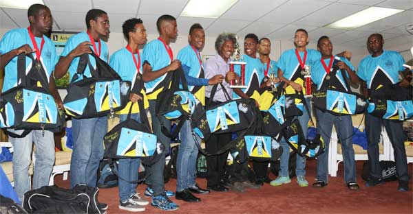 Image: Picture moment for Team St. Lucia and PS Youth Development and Sports Dr. Anthony George at the George F.L. Charles Airport VIP Lounge..