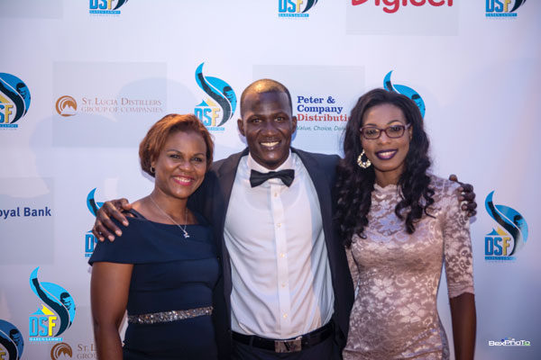 Image: Darren Sammy flanked by Siobahn James-Alexander, Country Manager and Louise Victor, Marketing and Communications Manager of Digicel.
