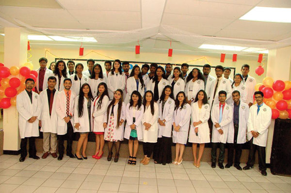 img: The latest batch of medical students at Spartan University in Vieux Fort
