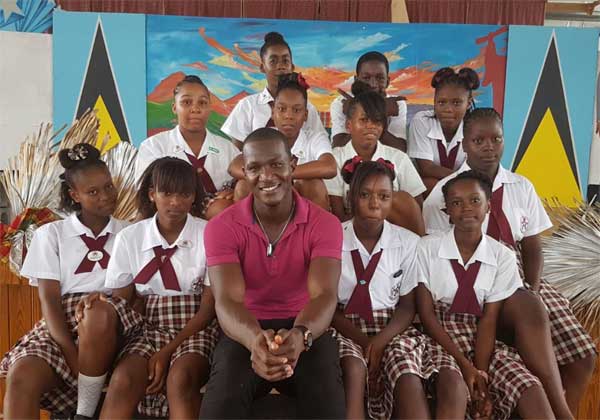 Image: Sammy with Gros Islet Secondary students.