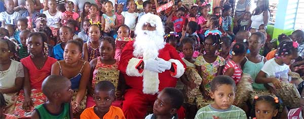 Image: Students at the Gros Islet Infant School with Santa.