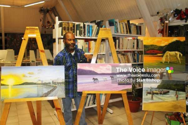Image of Artist Cedric George at Artist Circle’s first exhibition at Alliance Francaise last December. [PHOTO: Stan Bishop]