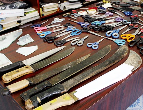 Image: The collection of weapons seized from students. [PHOTO: By PhotoMike]