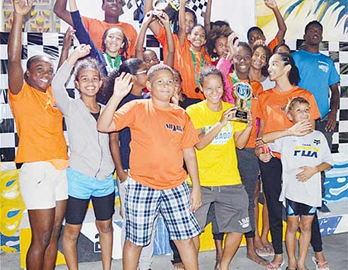 Image: Champion swim club Sharks says “Happy 38th Independence Celebration Saint Lucia.” (PHOTO: Anthony De Beauville)