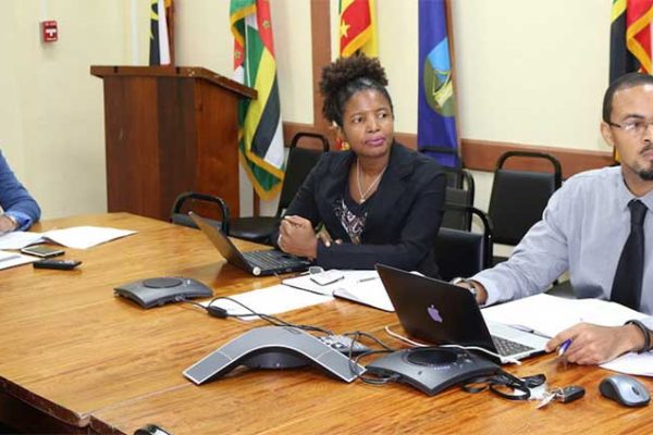 Image: OECS personnel at the meeting: Virginia Paul (centre) Head of the Trade Policy Unit, Tahira Carter (left) and Ramon Peachey (left) of OECS Communications