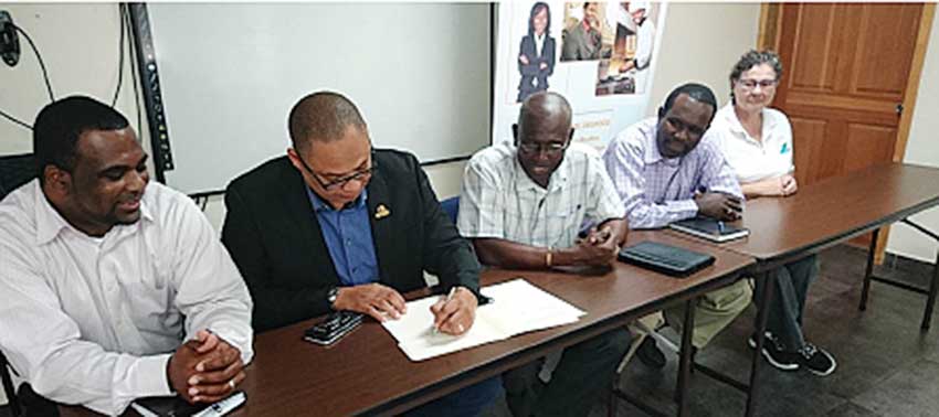 Image: Left to Right: Mr David Gumbs, CEO of ANGLEC; Mr Thomas Hodge, Executive Director, CARILEC; Mr Rodney Rey, Chairman of the Board of the ACC; Mr Steve Hodge, Network Operations Engineer, ANGLEC and Ms Janis Mckeag, TVET Coordinator signing the MoU at the ACC’s main conference room.
