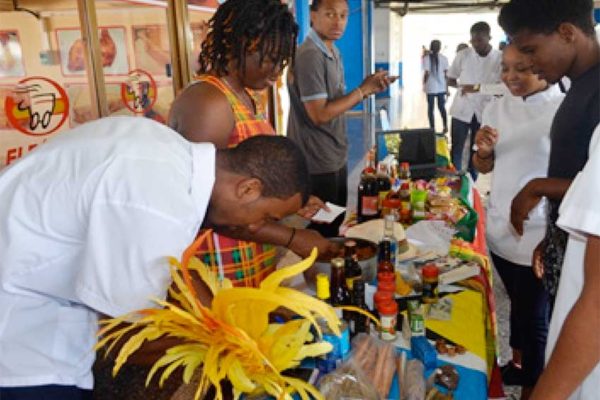 Image: St. Lucians displaying locally-manufactured products and snacks.