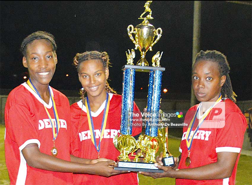 Image: (L-R) Dennery’s Ketina Joseph, goal scorer in the 2nd minute, Captain Sylvie Willie and Eliza Marquis, goal scorer in the 8th minute, share in the celebration. . (PHOTO: Anthony De Beauville)