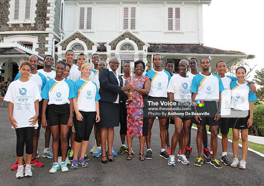 Image: A photo moment for these young aspiring athletes with Governor General Dame Pearlette Louisy and SLOC President Fortuna Belrose. (Photo: Anthony De Beauville)