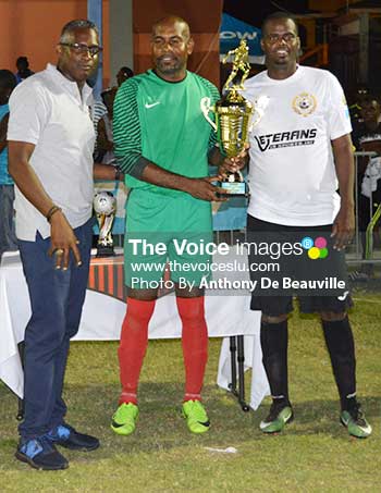 Image: CEO VISI, Saint Lucia All Stars captain Vilan Edward and Valencius Joseph share a trophy moment (Photo: Anthony De Beauville)