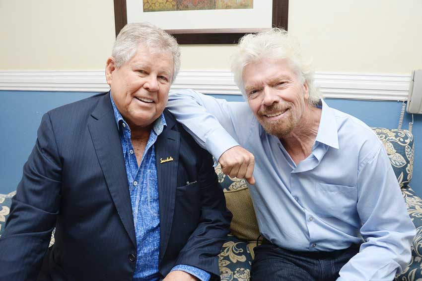Image: Gordon “Butch” Stewart (left), Chairman and Founder of Sandals Resorts International, and Richard Branson (right), Founder of Britain’s Virgin Group.