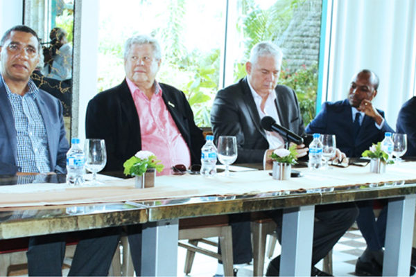 Image: (from left to right) – Jamaican Prime Minister Andrew Holness, Sandals Chairman/Founder Gordon “Butch” Stewart, Prime Minister Allen Chastanet, Minister Dominic Fedee and Senior Project Manager, SRI, Mark Harding. [PHOTO: Stan Bishop]