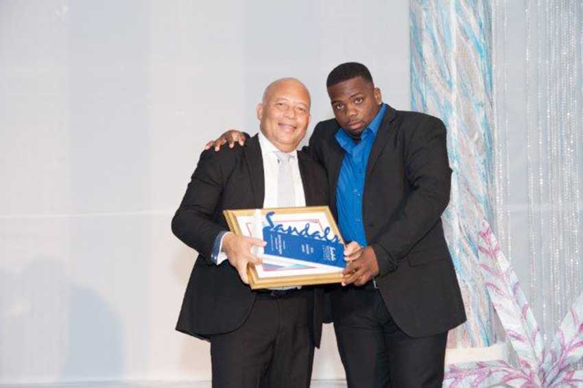 Image: Diamond Team Member, Jammer Georges, receives his award from General Manager, Winston Anderson.