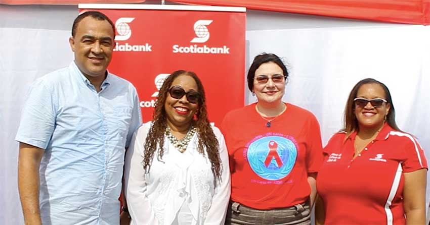 Image: L-R: Jamaica’s Health Minister Dr. Christopher Tufton, Executive Director of the Jamaica National Family Planning Board Dr. Denise Chevannes, UNAIDS Country Director to Jamaica ManoelaManova and Hope McMillan Canaan |Scotiabank Jamaica‘s Public & Corporate Affairs Manager at the Regional Testing Day event in Mandela Park on Friday June