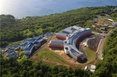 img: Aerial view of the medical complex near the Millennium Highway with OKEU Hospital at the forefront.