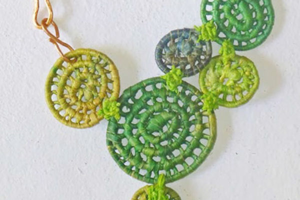 Image of green basket necklace by Finola Jennings-Clark.