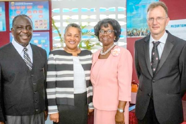 Pictured from L-R are: His Lordship the Hon. Justice K. Neville Adderley (High Court Judge (Ag), TVI Commercial Division); Her Ladyship the Hon. Dame Janice M. Pereira DBE, Chief Justice; Her Excellency Dame Calliopa Pearlette Louisy, Governor General of Saint Lucia; and His Lordship the Hon. Justice Gerard Wallbank, (High Court Judge (Ag), TVI Commercial Division).