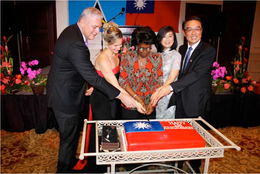Image: Prime Minister Chastanet and wife, Raquael, join Dame Pearlette Louisy and Taiwanese Ambassador Shen and his wife, Ling-hon, in cutting the cake at the recent reception in honour of Taiwan’s 106th National Day.