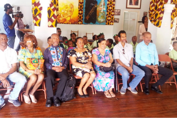 Image of The St. Omer Family alongside PABA, Teachers and Students