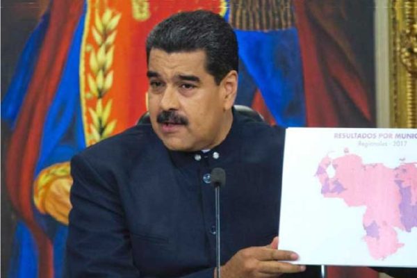 Image of Maduro showing a map of Venezuela depicting the states his party won in Sunday’s elections.