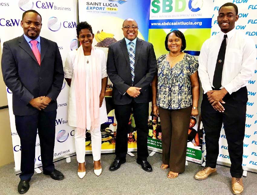 Image: (From left to right): Anselm Mathurin (Flow), Sabina Valmont (Southern Business Association), Titus Preville (Department of Commerce), Paula James (Manufacturers Association), and Wilton Jeremie.