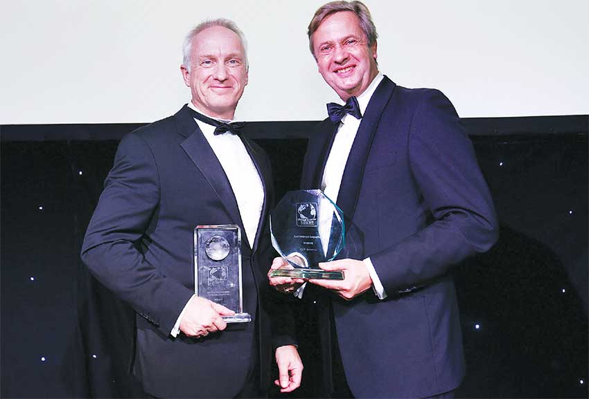 Image of Peter Collins, Executive Vice President of Operations, C&W Networks and Robert Boreel, International Accounts Director Voice, Liberty Global.